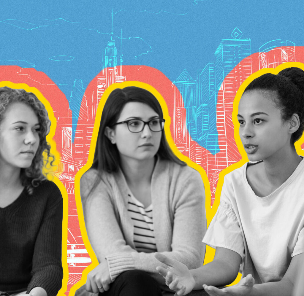 Image of three people talking. 