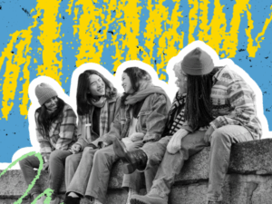 young people sitting on a wall