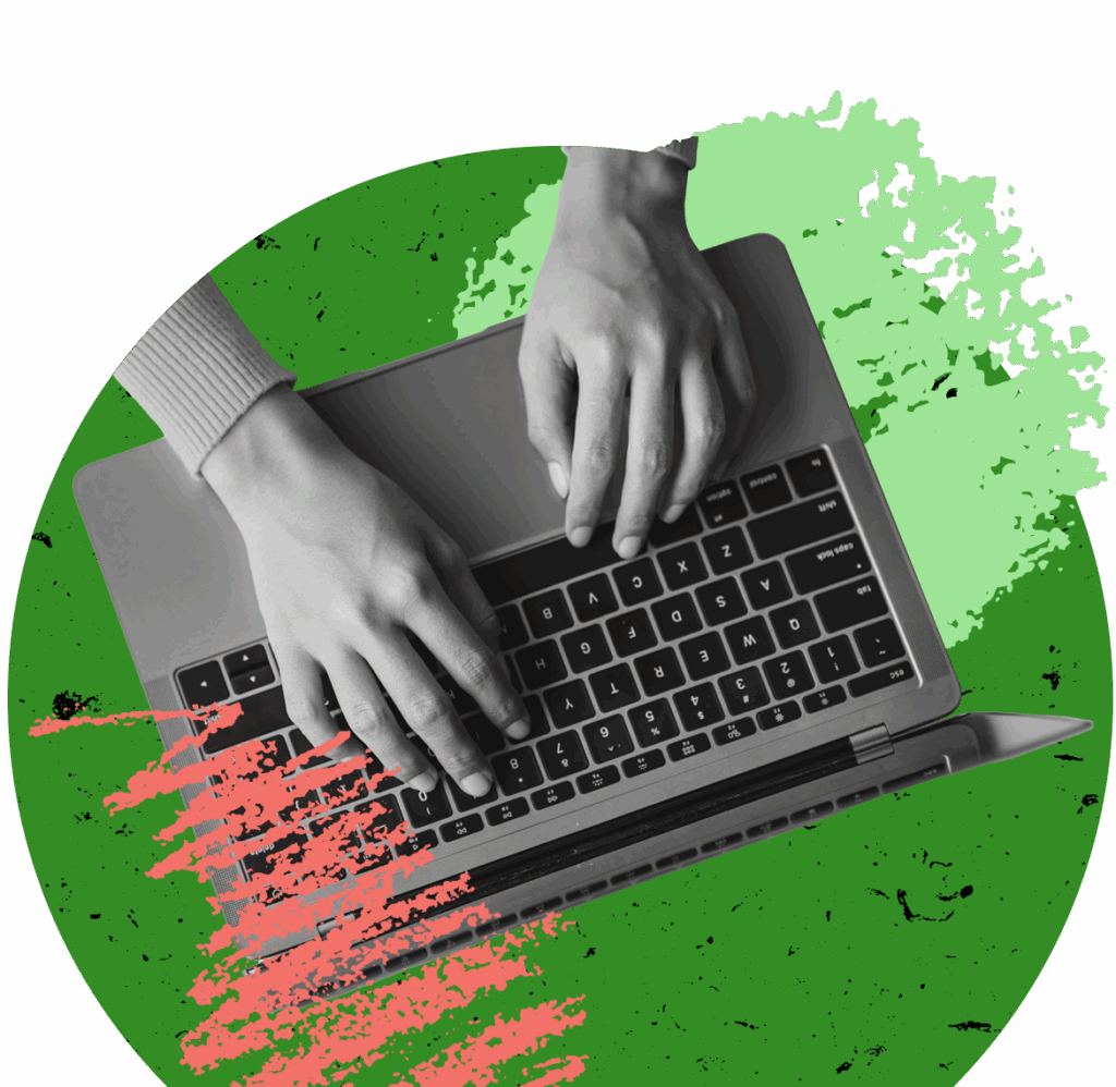 hands typing on a laptop computer