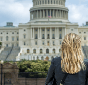 Woman defiantly looking at the united states capital building