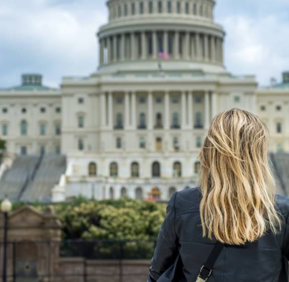 Woman defiantly looking at the united states capital building